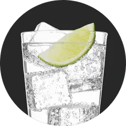 Glass of sparkling water with lime